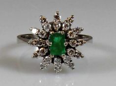 Ring, WG 585, 1 Smaragd ca. 0.50 ct., im Smaragdschliff, Smaragd mit Chip an der Rundiste, 24