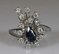 Ring, WG 750, 1 tropfenförmiger facettierter Saphir, 13 Brillanten zus. ca. 0.65 ct., 4 g, RM 17.5