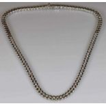 Collier, WG 750, 57 Brillanten zus. ca. 5.0 ct., etwa tw/si, 83.99 g 21.01 % buyer's premium on