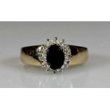 Ring, WG/GG 585, 1 oval facettierter Saphir, 14 Besatz-Diamanten, 3 g, RM 17.5 21.01 % buyer's