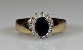 Ring, WG/GG 585, 1 oval facettierter Saphir, 14 Besatz-Diamanten, 3 g, RM 17.5 21.01 % buyer's