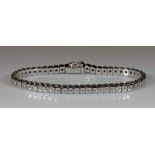 Armband, WG 750, 56 Brillanten zus. ca. 3.0 ct., etwa tw/vsi, 33.02 g 21.01 % buyer's premium on the