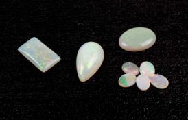 Konvolut Opale in verschiedenen Schliffen Vollopal, Farbe milky, 34-tlg., Australien, die Steine