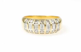 Damenring 750 Gelbgold, 7 Baguette-Diamanten und 14 Diamanten, gesamt ca. 1,2 ct, vs-si, H-J,