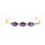 Armband750 Gelbgold, 70 Brillanten, gesamt ca. 2,00 ct, 3 Amethysten, Länge 19,5 cm, Amethyste 1,6