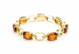 Armband750 Gelbgold, 14 Brillanten, gesamt ca. 0,7 ct, 7 Citrine, Länge 19,5 cm, Durchmesser Citrine