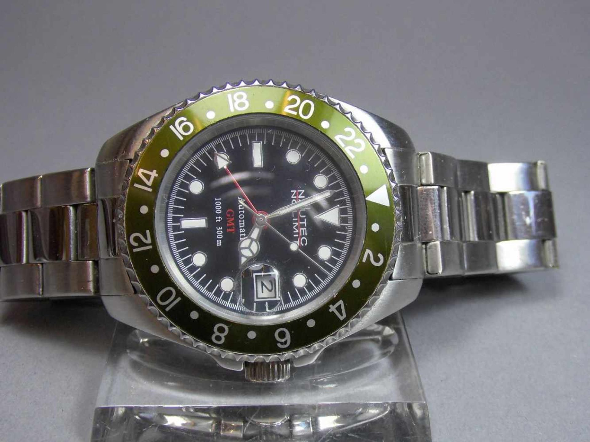 ARMBANDUHR : NAUTEK NO LIMIT GMT / wristwatch, Automatik-Uhr. Rundes Stahlgehäuse mit Gliederarmband