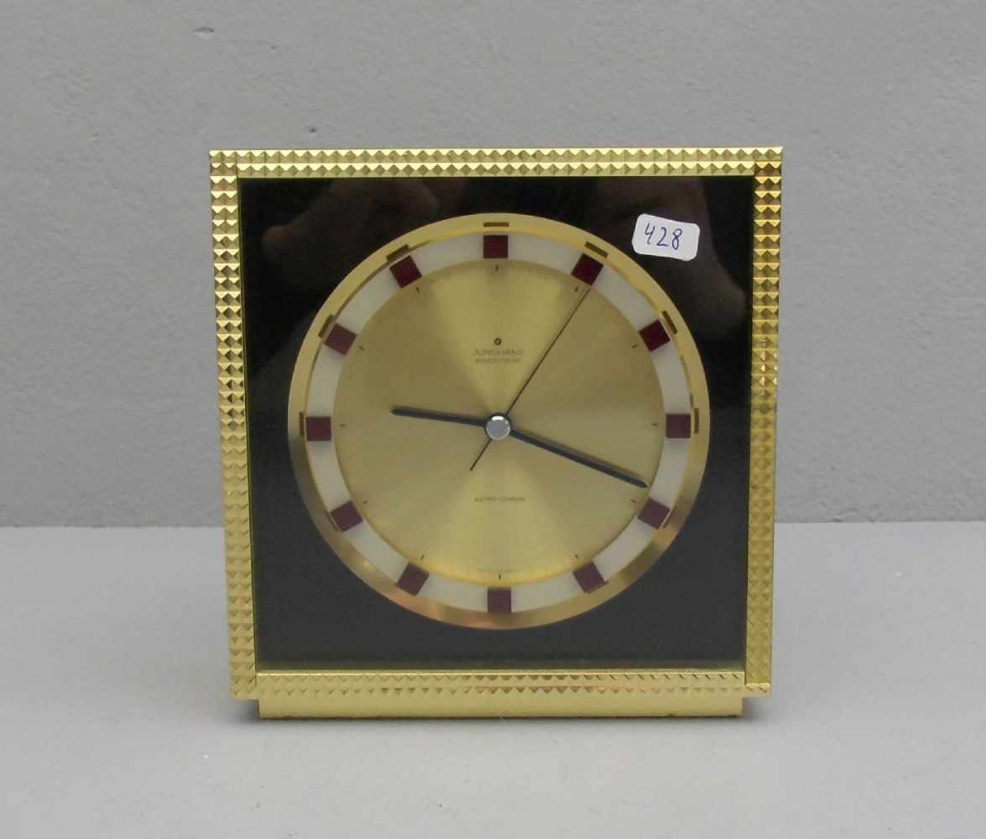 TISCHUHR / table clock, 20. Jh., Manufaktur Junghans. Messinggehäuse, schauseitig verglast. Auf