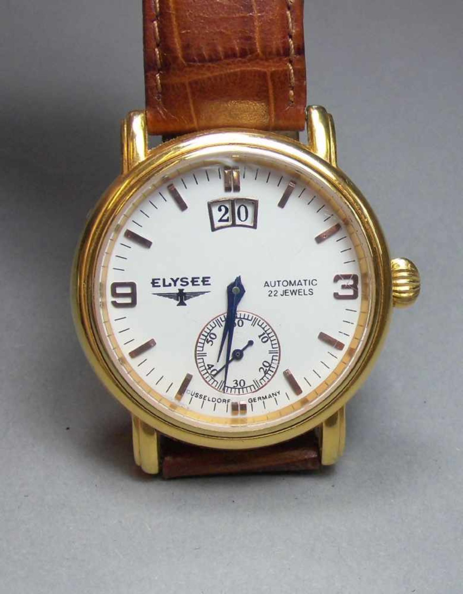 ARMBANDUHR / wristwatch, ELYSEE Uhren GmbH / Deutschland. Rundes goldfarbenes Edelstahlgehäuse mit