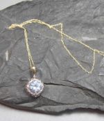 ANHÄNGER MIT AQUAMARIN AN KETTE / pendant and necklace, 10 kt. Gelbgold (417er, insgesamt 1,6 g);