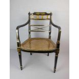 REGENCY - ARMLEHNSTUHL MIT GEFLECHT, um 1820. Klassizistischer Stuhl auf vorderen konischen Beinen