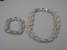 SCHMUCKSET, Italien, 925er Silber (160g), bestehend aus Collier (L:43cm) und Armband (L:21cm).