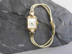 VINTAGE-ARMBANDUHR, 750er Gelbgold (20g), Firma Regalis ca. 1930.Dieses Los wird in einer online-