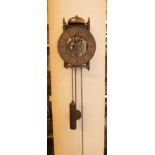 KLEINE EISENUHR / SKELETTUHR / wall clock, 20. Jh., Metall, Kettenzug mit Eisengewicht und Pendel (