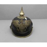 HELM / PREUSSISCHE PICKELHAUBE, lederne Helmglocke mit Schirm, Nackenschirm und Metallmonturen.