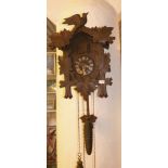 KLEIN KUCKUCKSUHR / cuckoo clock, Schwarzwald, 20. Jh., Holzgehäuse mit geschnitzten Partien in Form