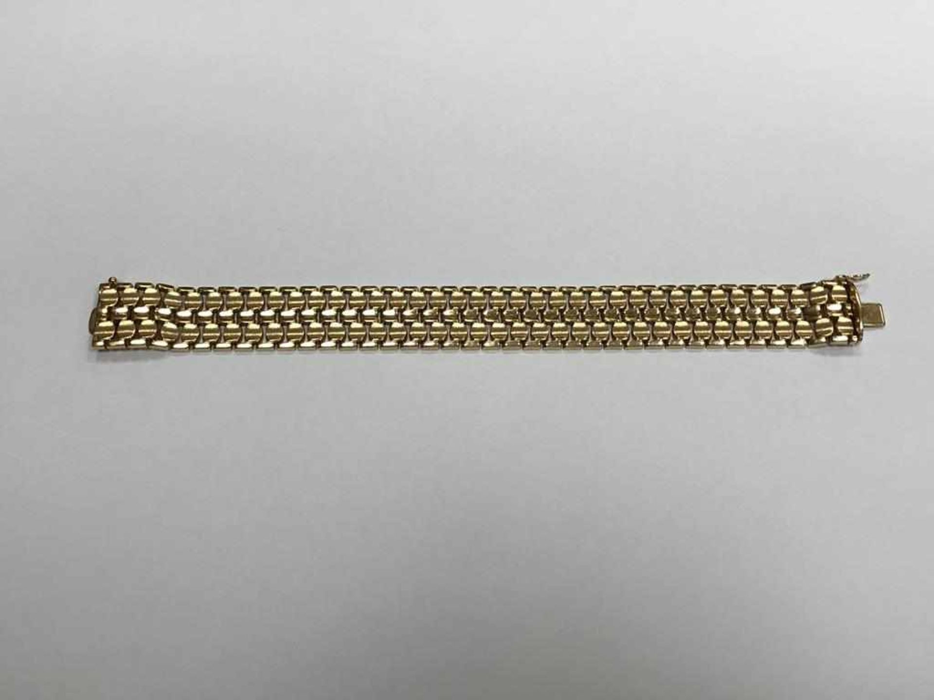 Goldarmband um 1950750 Gold , 2-reihiges Goldarmband, Alter um 1950, Maße: Länge 19,5 cm, Breite