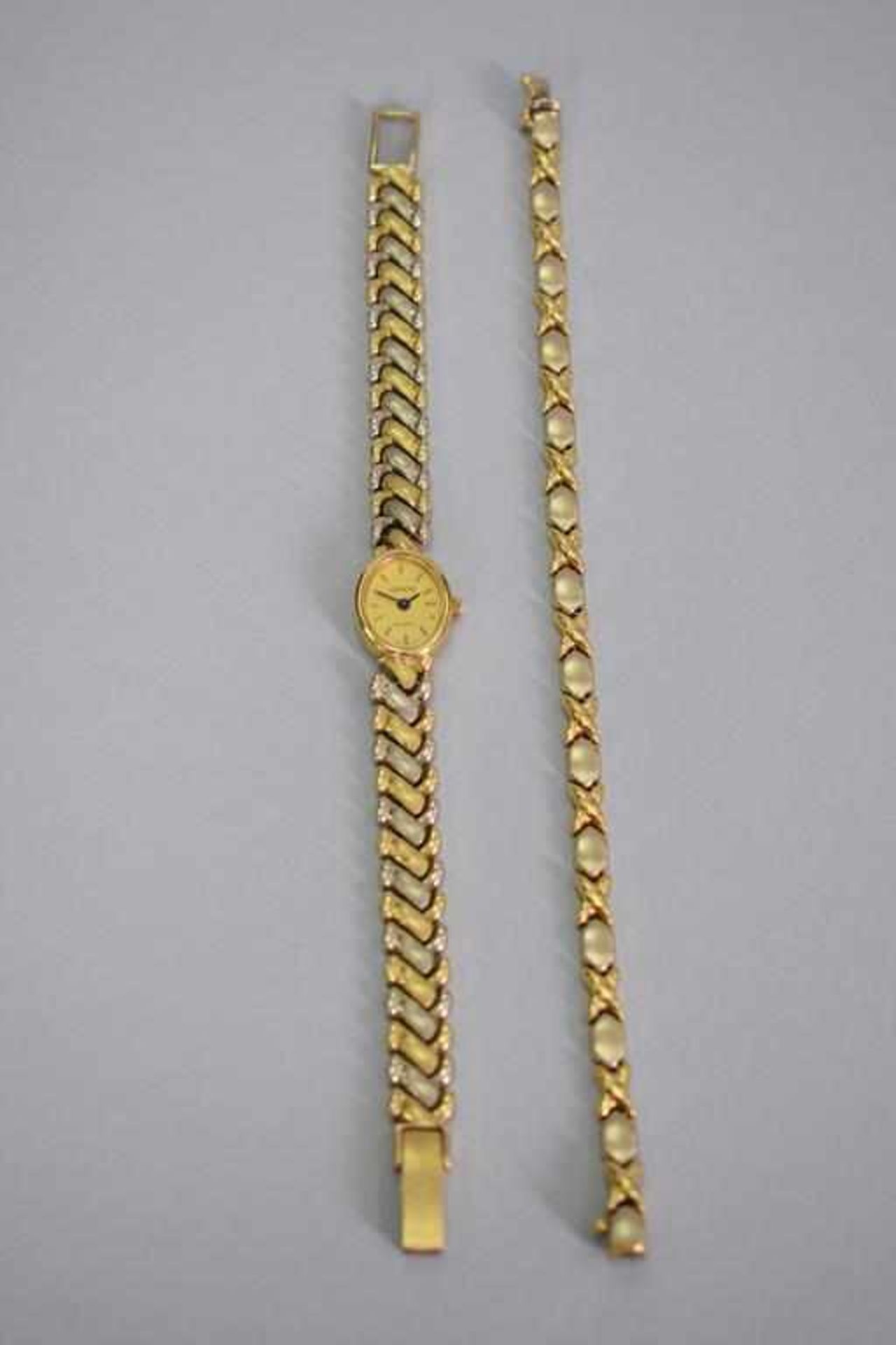 Konvolut Goldschmuck 750 & 585 ca. 27,5 gr.Material: 750 Gold Armband ca. 10 gr.Maße: 18,5 cm x 0,