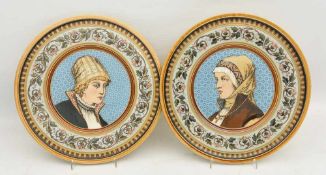 VILLEROY&BOCH METTLACH: ZWEI WANDTELLER, bemalte und glasierte Keramik, gemarkt, um 1900 Zwei