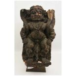 GOTTHEIT BULA(?), beschnitztes Holz/Eisen,Tibet Ende 19. Jahrhundert Handbeschnitzte Figur einer