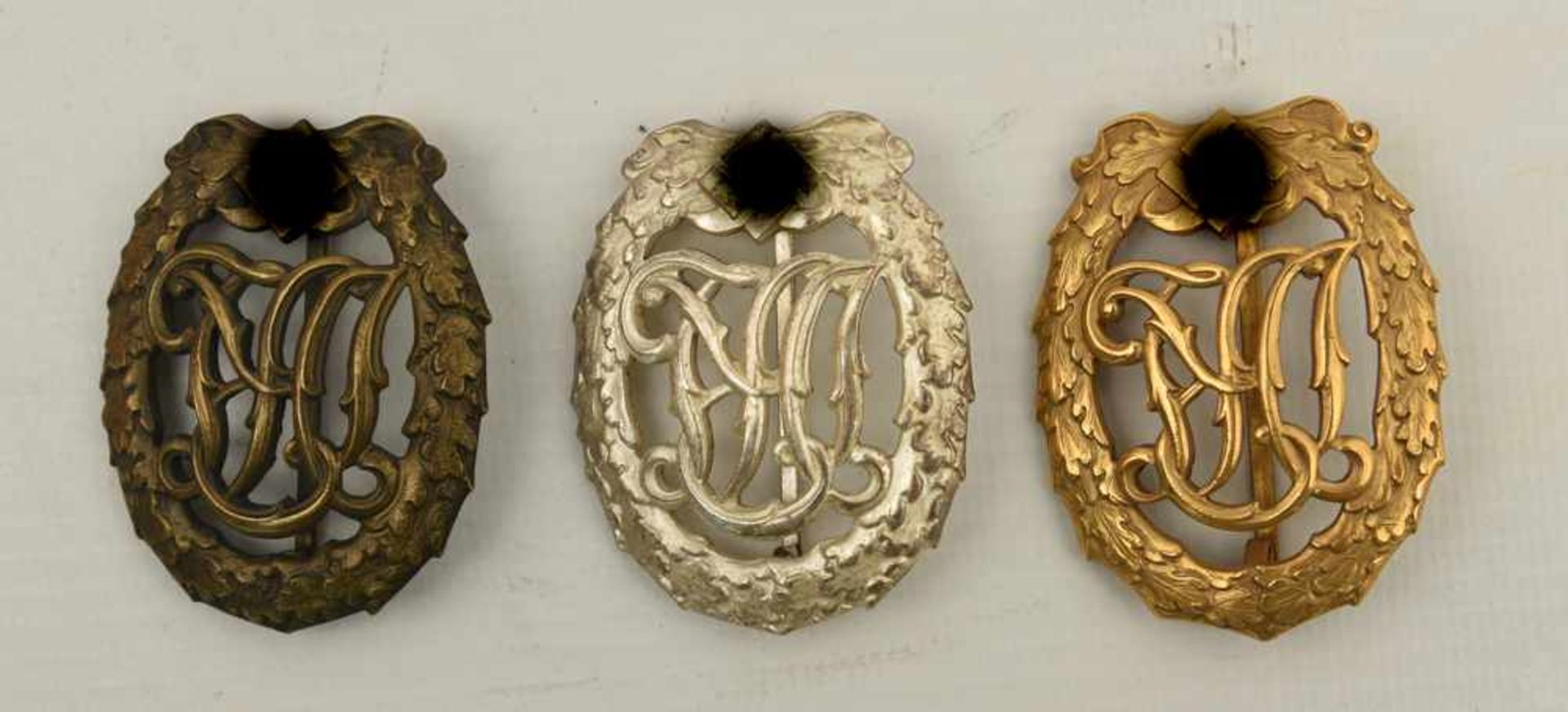 DREI REICHS-SPORTABZEICHEN, Kupfer versilbert/vergoldet/bronziert, Drittes Reich um 1940 Drei - Bild 2 aus 2