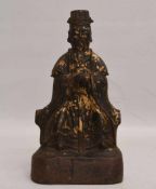 "HERRSCHAFTSBILDNIS", Eisenguss-Statuette mit Blattgold, China späte Ming-Dynastie Bildnis eines