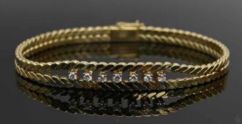 ARMBAND, mit 7 Brillianten besetzt, 585er Gold, Deutschland.17,8gLänge:18 cm