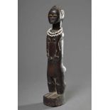 Afrikanische Ahnenfigur mit Muschelkette, Holz geschnitzt, H. 35cm, SpannungsrisseAfrican ancestor