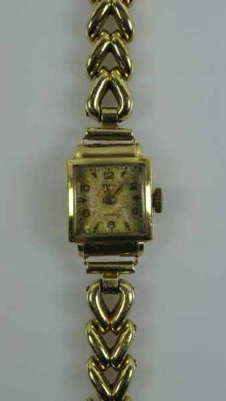 ARMBANDUHR Revue, Handaufzug, viereckiges Goldgehäuse mit durchbrochenem Armband, beides Gelbgold