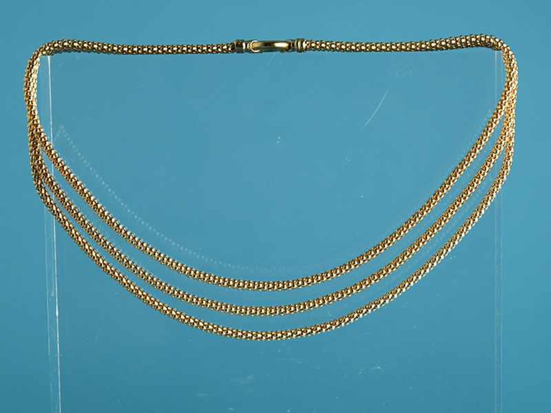 Dreireihiges Collier, 21. Jh. 750/- Gelbgold. Gesamtgewicht ca. 42,2 g. Dreireihiges Collier aus