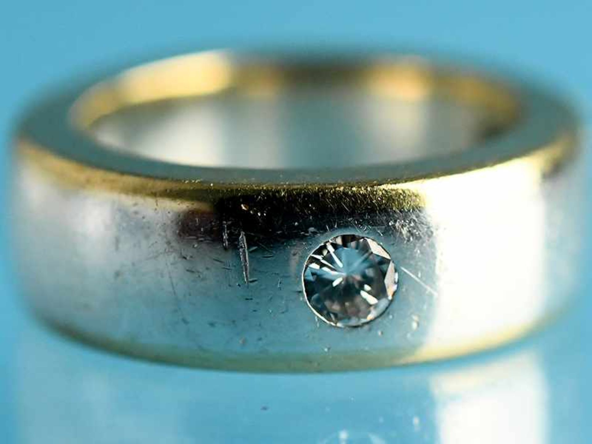 Bandring mit einem Brillanten ca. 0,10 ct, Goldschmiedearbeit, 21. Jh. 925/- Silber und 750/-