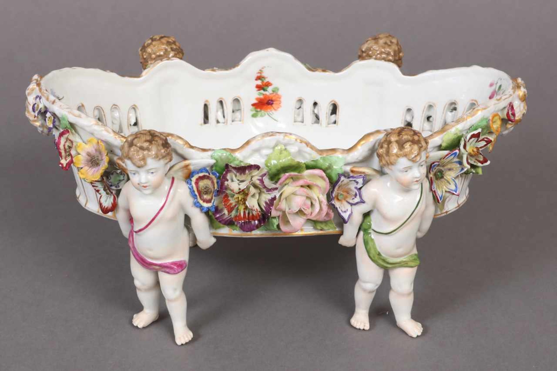 SCHIERHOLZ/PLAUE Porzellan-Jardiniere um 1907-1927, von 4 Amoretten getragene ovale Schale,