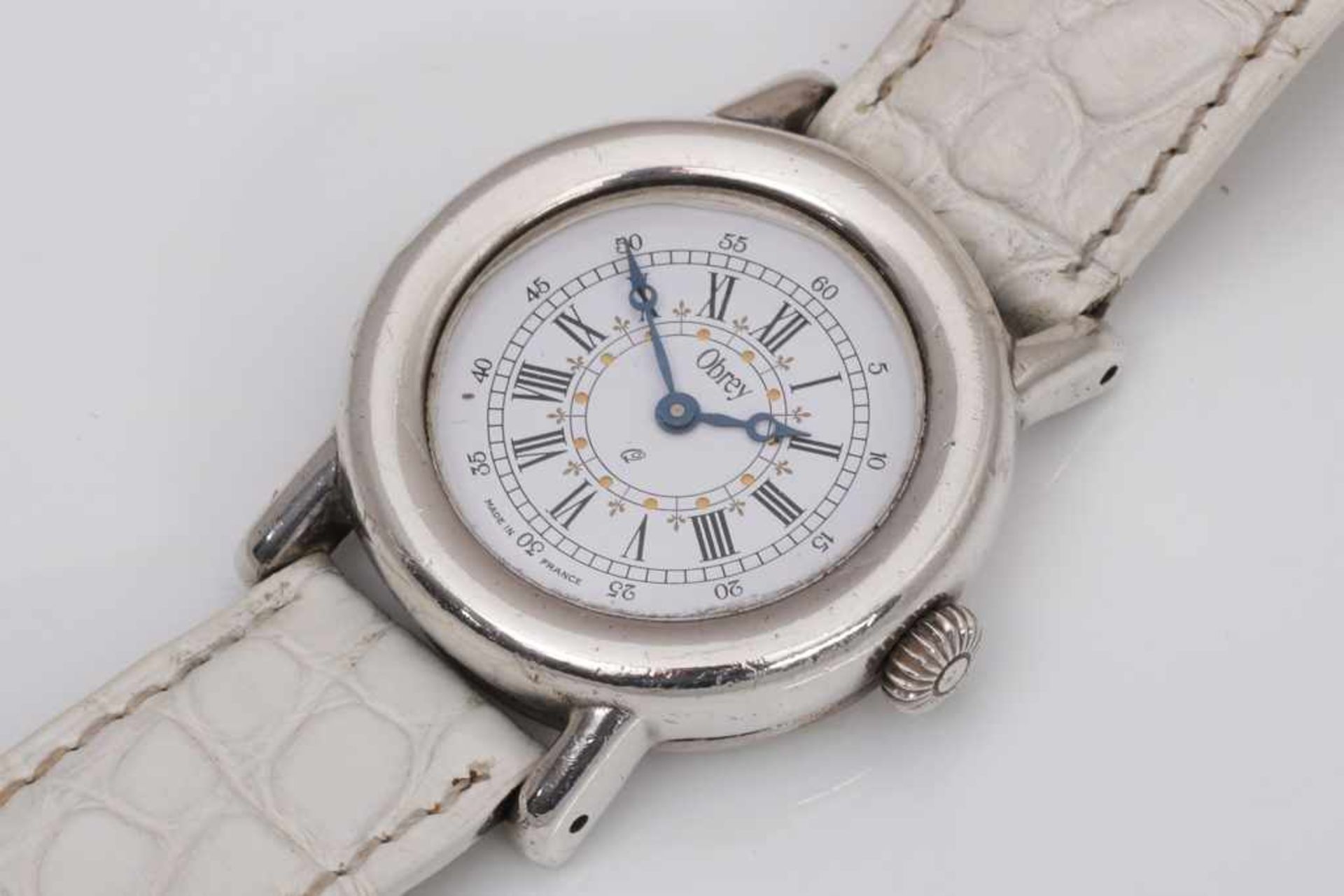OBREY (Paris) Armbanduhr ¨June¨ (?) rundes Silbergehäuse (D 3cm), Quartzwerk, weißes Zifferblatt mit