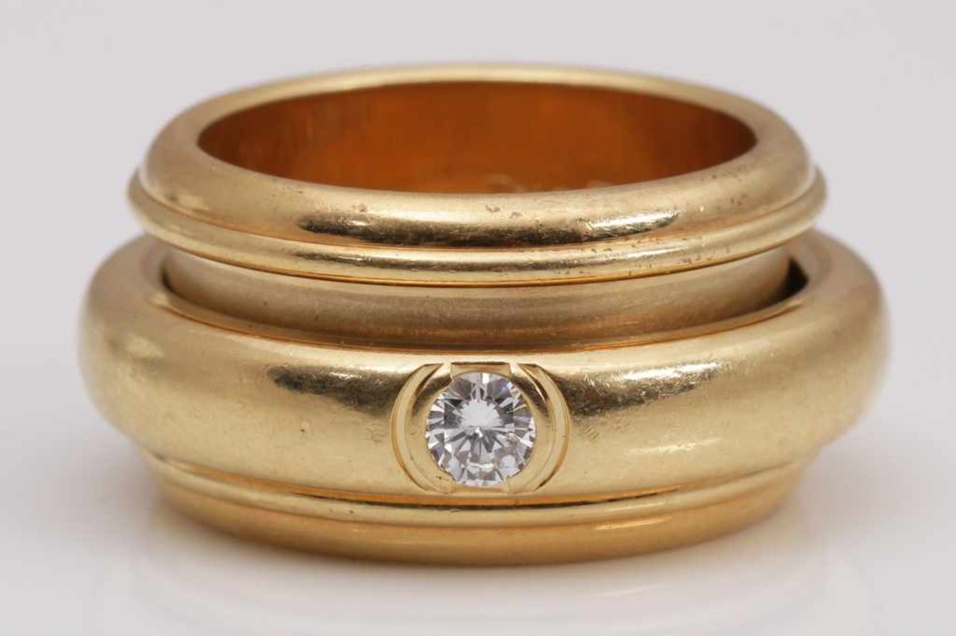 PIAGET Possession Ring mit Brillant 750er Gelbgold, sogenannter Spielring mit 1 Brillanten, ca. 0,