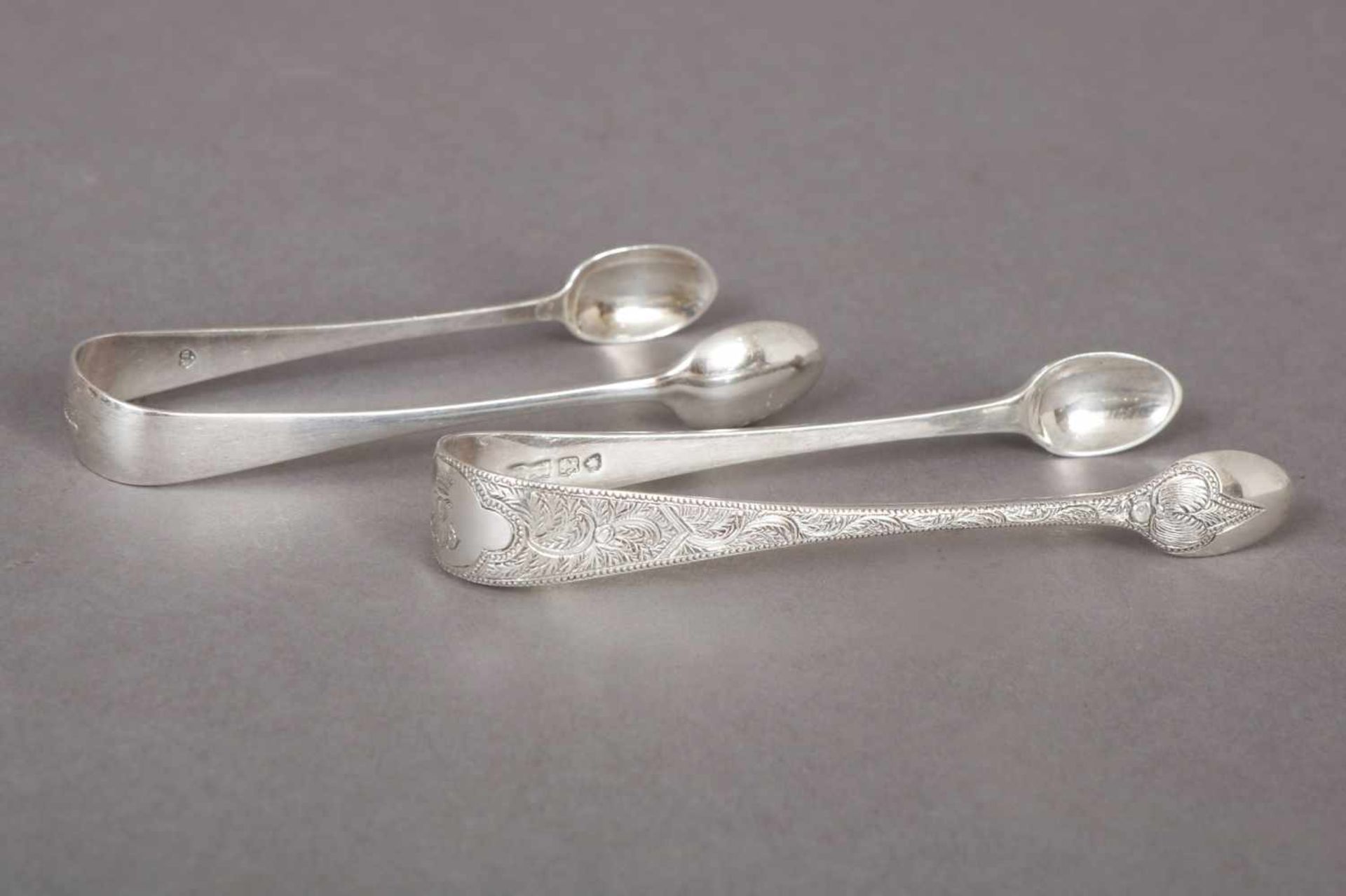 Paar Zuckerzangen Silber (7-zackige Krone), leicht formverschieden, zusammen ca. 38g