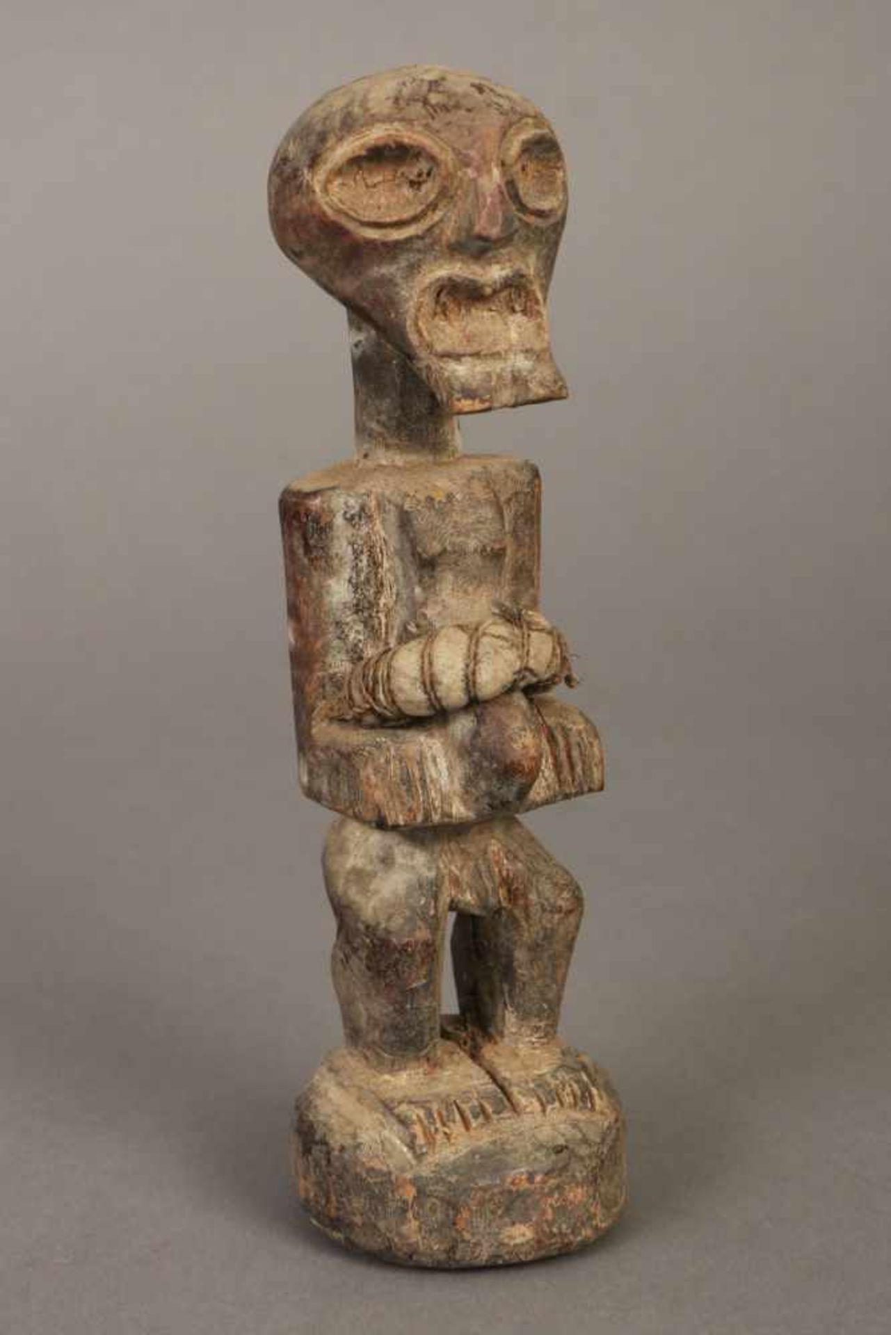 Afrikanische Ritualfigur ¨Männliche Figur mit großem Schädel und Gürtel aus Stoff¨wohl Baule (