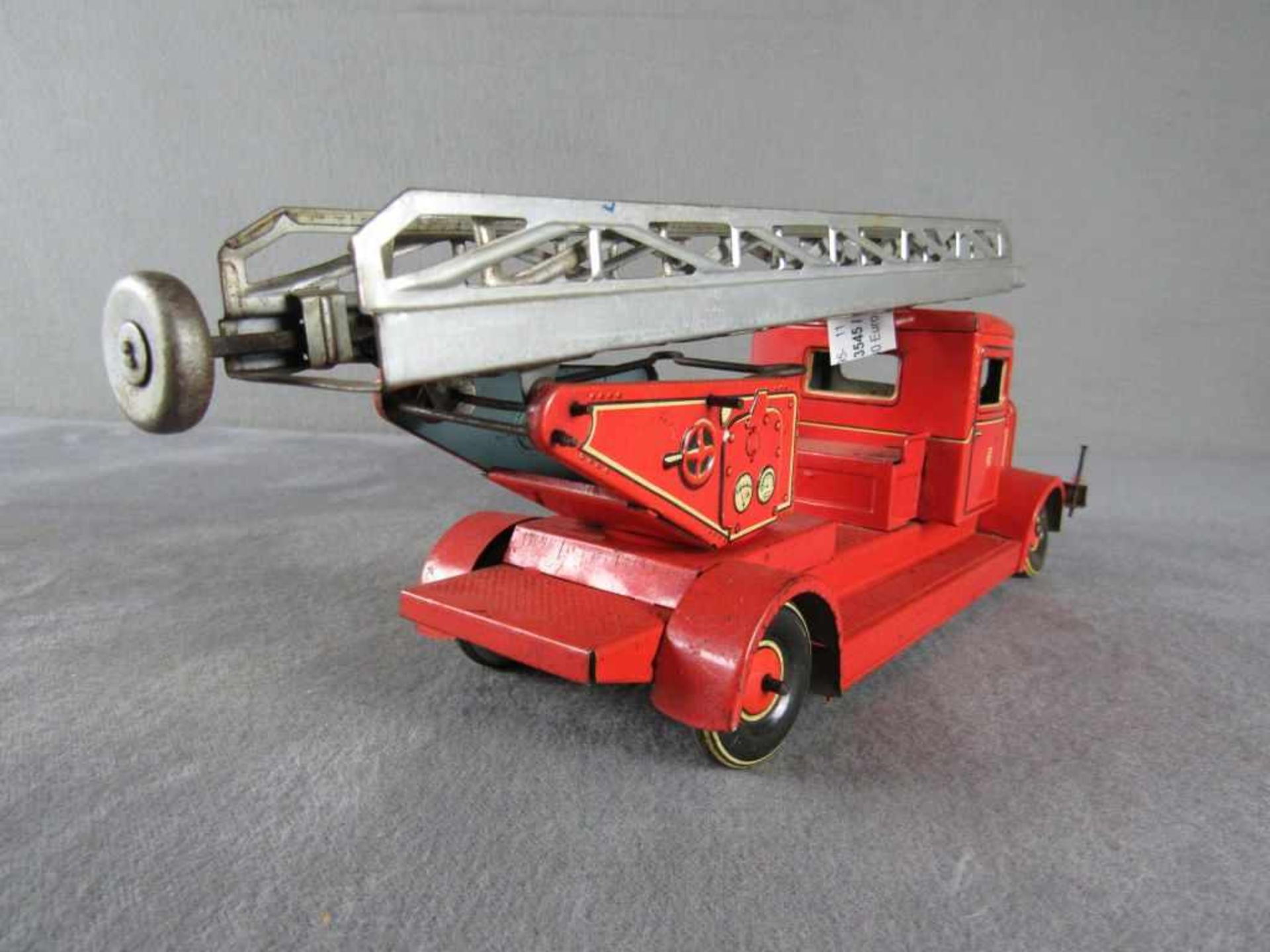 Blechspielzeugauto Tipp&Co Feuerwehrwagen mit Leiter, alle Funktionen in Ordnung Maße 12,5x30x9,5 - Image 4 of 6