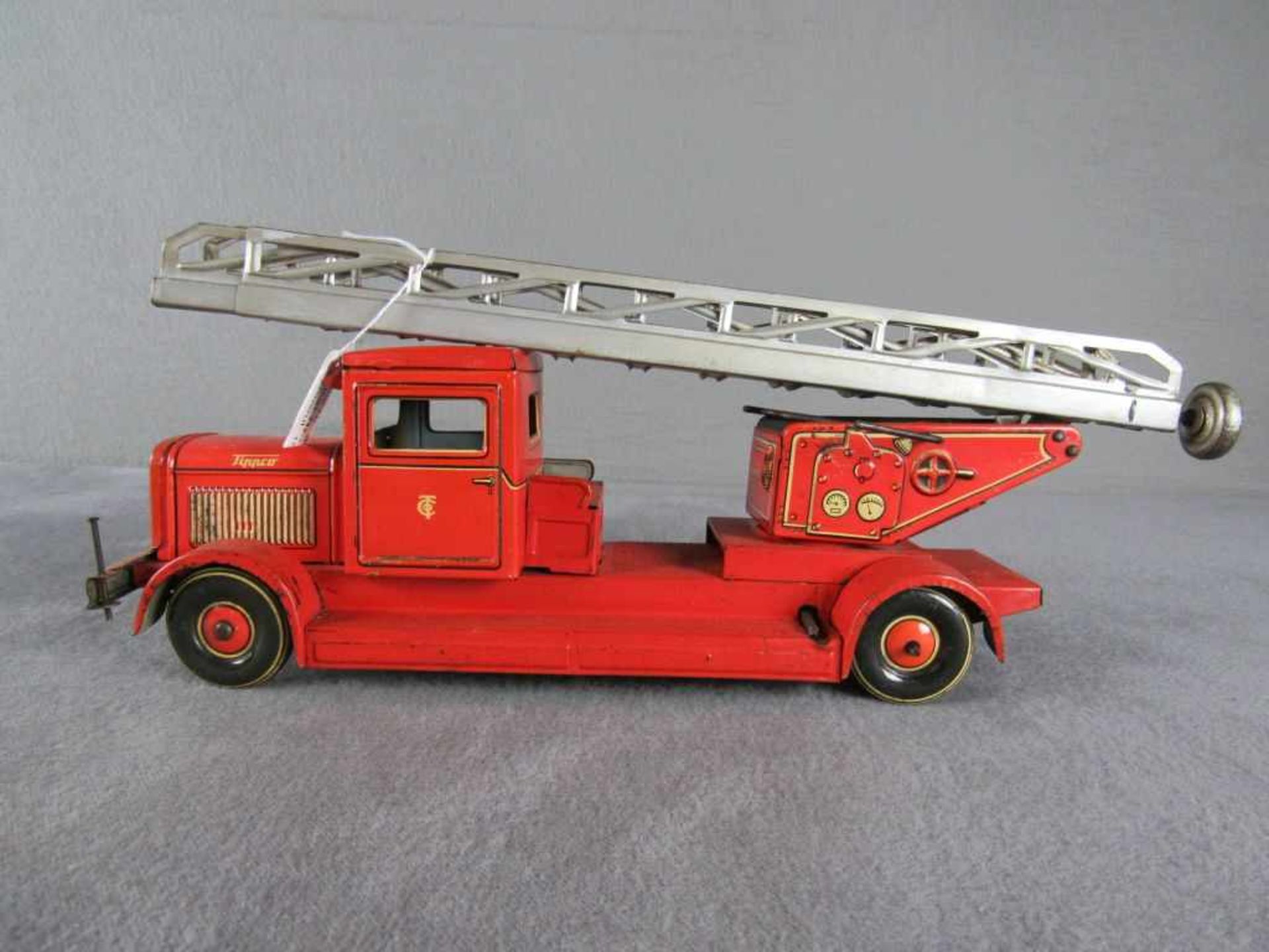 Blechspielzeugauto Tipp&Co Feuerwehrwagen mit Leiter, alle Funktionen in Ordnung Maße 12,5x30x9,5