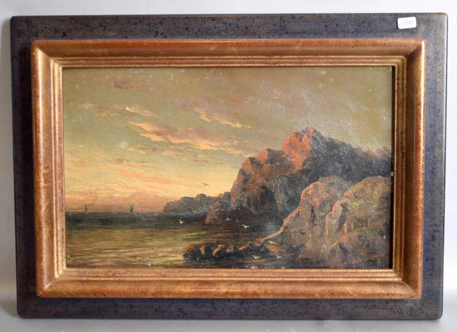 Unbekannter Maler dat. 1870, Küstenlandschaft mit Segelboot und untergehender Sonne, Öl/