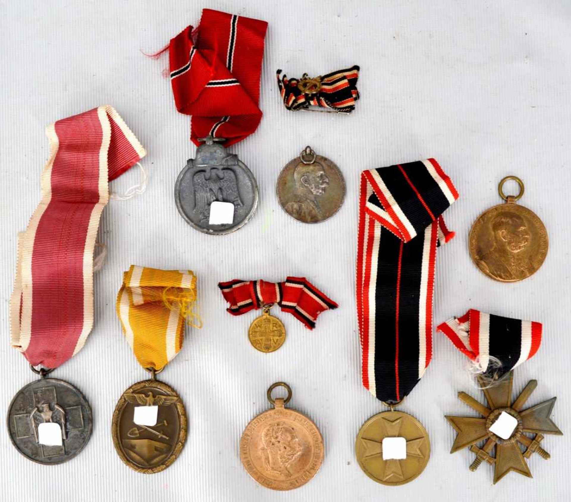 Konvolut zehn Orden fünf Orden III. Reich, vier Medaillen und ein Abzeichen, um 1920-1940