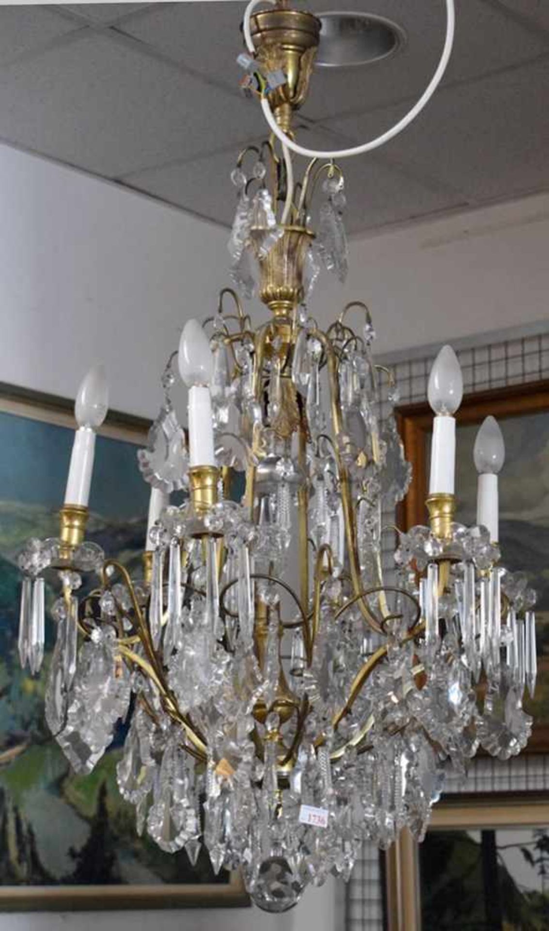 Deckenlampe 7-lichtig, Messing, mit geschwungenen Armen, farbl. Glasgehänge, H 97 cm, Dm ca. 60