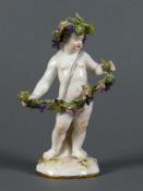 Bacchanten-Putto (Meissen, 19.Jh.) mit Weintraubengirlanden; "Der Herbst" Modell-Nr. A 69 von Johann