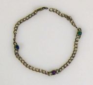Armkette 8ct GG; besetzt mit kleinem Saphir, Rubin, Smaragd; L: 19 cm; 2,8g; Verschluss defekt