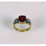 Damenring 18ct GG und WG; besetzt mit Farbstein in rot; 7g; Ringgr. 56