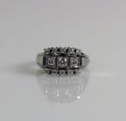 Damenring 14ct WG; besetzt mit insgesamt 0,30ct Brillanten; Ringgr. 57; ca. 5g