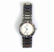 CORUM-Armbanduhr "ROMULUS"; Stahl/Stahl; Lunette mit röm. Anzeige; Quarz; D: Gehäuse 31,5 mm;
