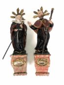 2 Heiligenfiguren (19.Jh.) wohl Jacobus bzw. Nonne; Holz vollrund geschnitzt; farbig gefasst;