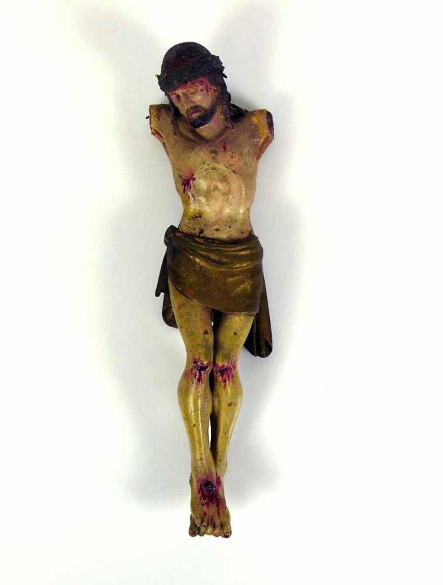 Christuskorpus (19.Jh.) Holz geschnitzt und tlw. farbig gefasst; Arme fehlen; H: ca. 35 cm