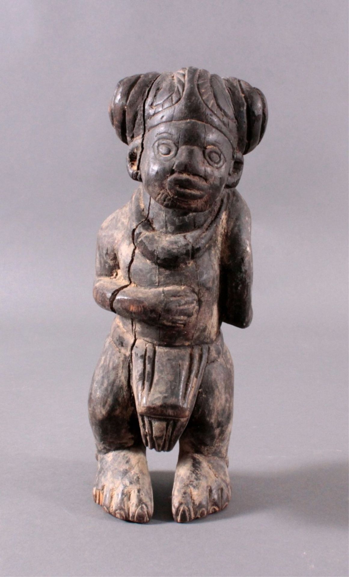 Afrikanische Figur 1. Hälfte 20. Jh.Wohl vom Stamm der Nonoli oder Mende, Holz, dunkelpatiniert,