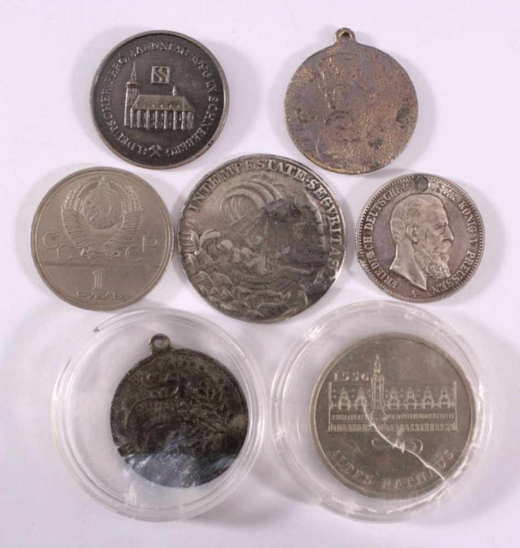 Kleine Medaillen und Münzsammlung1 Silbermedaille heiliger Georg, ca. Durchmesser 3,6, 9,7g.1x 2